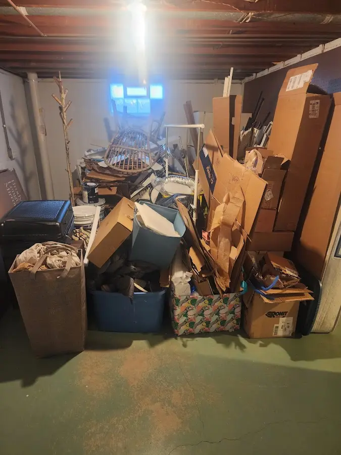 Roll-off dumpster container at job site for 4 Yard Dumpster Rental in Lenox